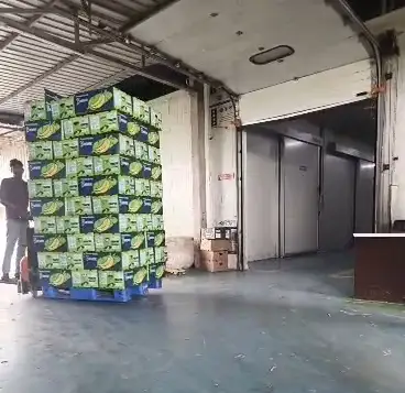 A pallet of cartons staged before loading